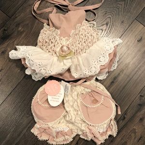 NWT doll cake outfit. Never worn. Size 6-9 months